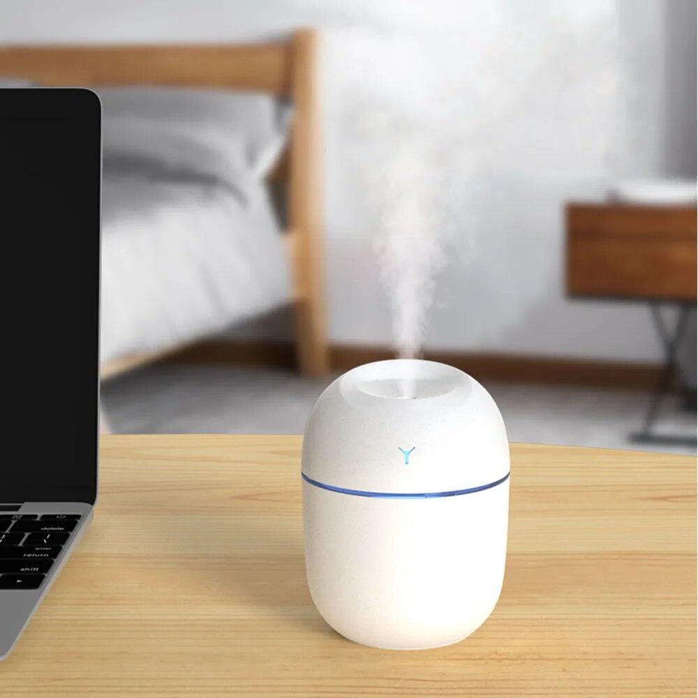 "Experience Serene Bliss: USB-Powered 250ML Mini Aromatherapy Humidifier with Romantic Light - Perfect for Home, Car, and Office Air Purification"