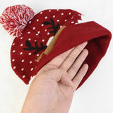 "Santa's Magical Hat of Christmas Cheer: A Funky Sweater for Your Head, with Blinking Lights and Ridiculous Cartoon Characters - Guaranteed to Make Your Kids Giggle and Brighten Up Their New Year!"